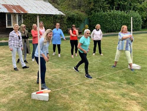 A group of people playing a game
AI-generated content may be incorrect.