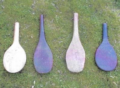 Several paddles in a row
AI-generated content may be incorrect.