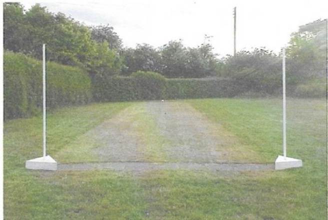 A long shot of a grass field
AI-generated content may be incorrect.